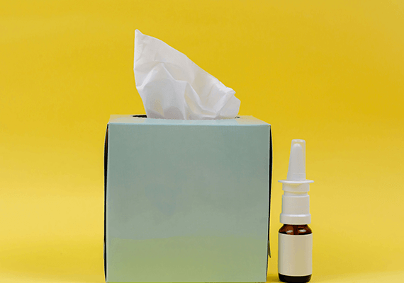 Tissue and nasal spray used for allergy relief and sinus care at Fairmont Family Practice in La Porte, TX.
